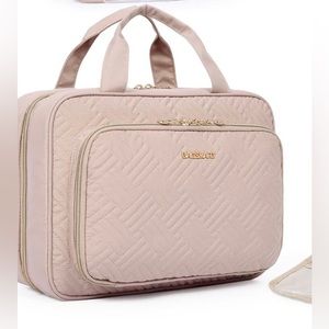 BAGSMART Hanging Toiletry Bag and Makeup Organizer, Medium in Pink
